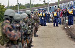 Menekülők és rendőrök a magyar-horvát határon MTI Fotó: Máthé Zoltán