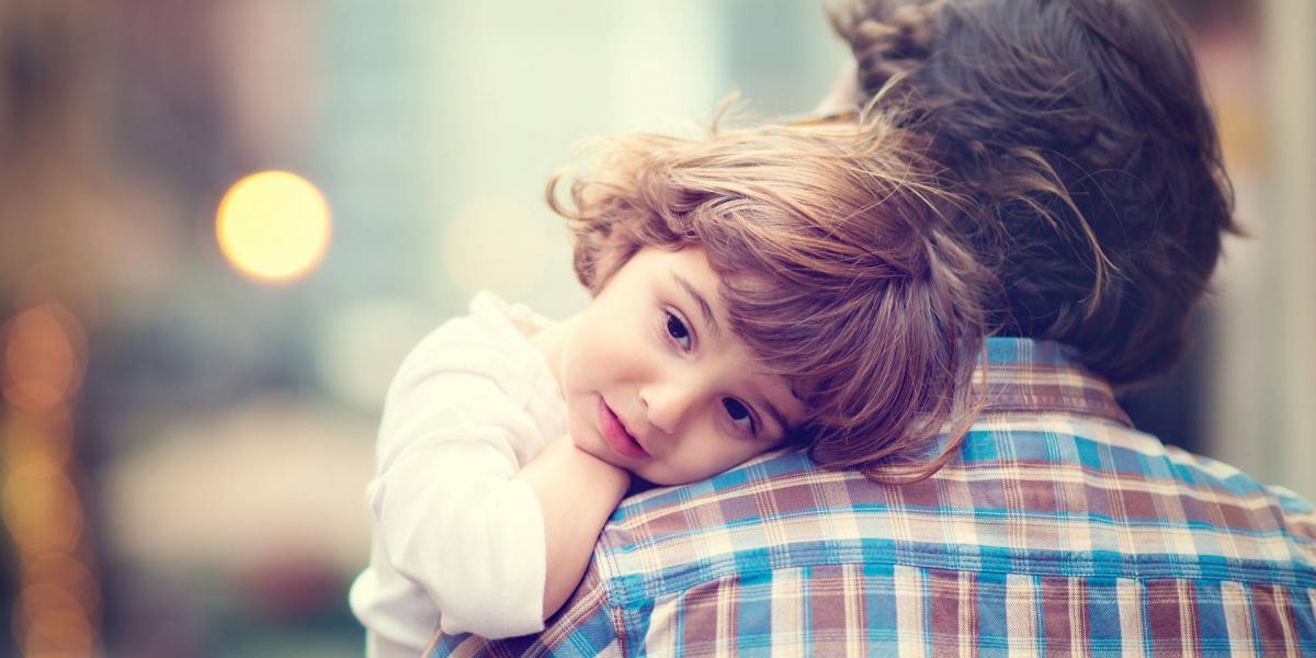 Little,Girl,Resting,On,Her,Father`s,Shoulder