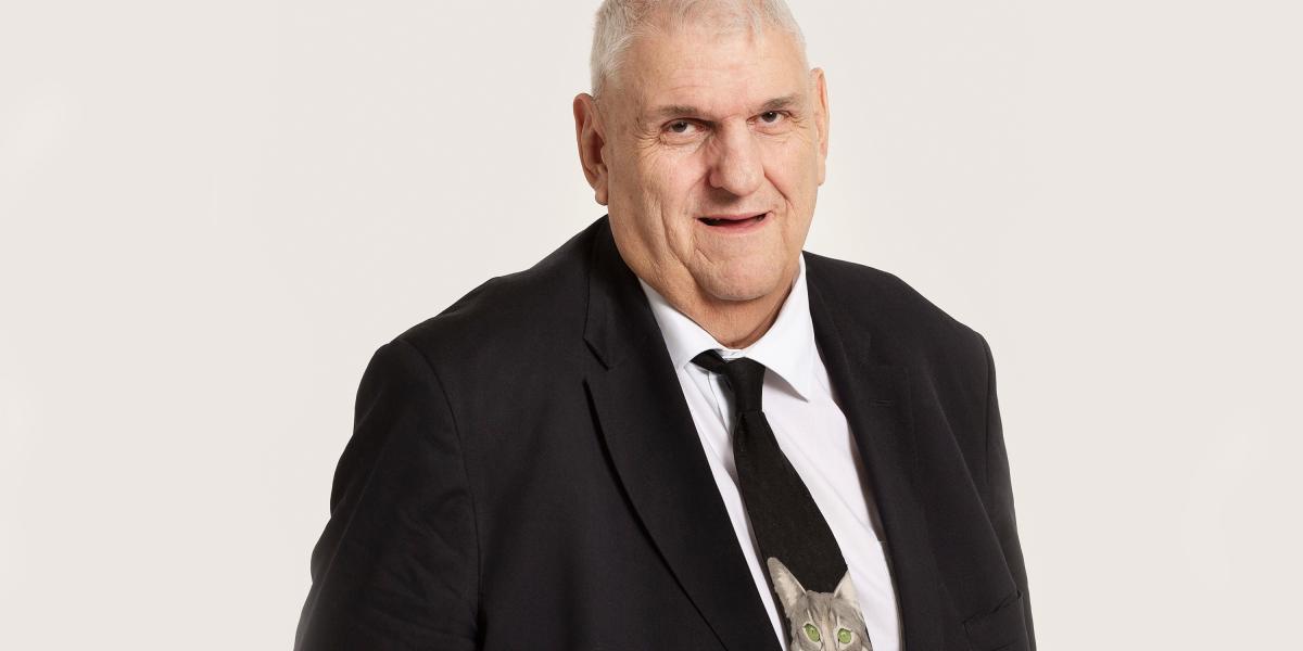 Daniel Brélaz névjegye egy macskát és egy számítógép egeret ábrázoló széles nyakkendő volt.