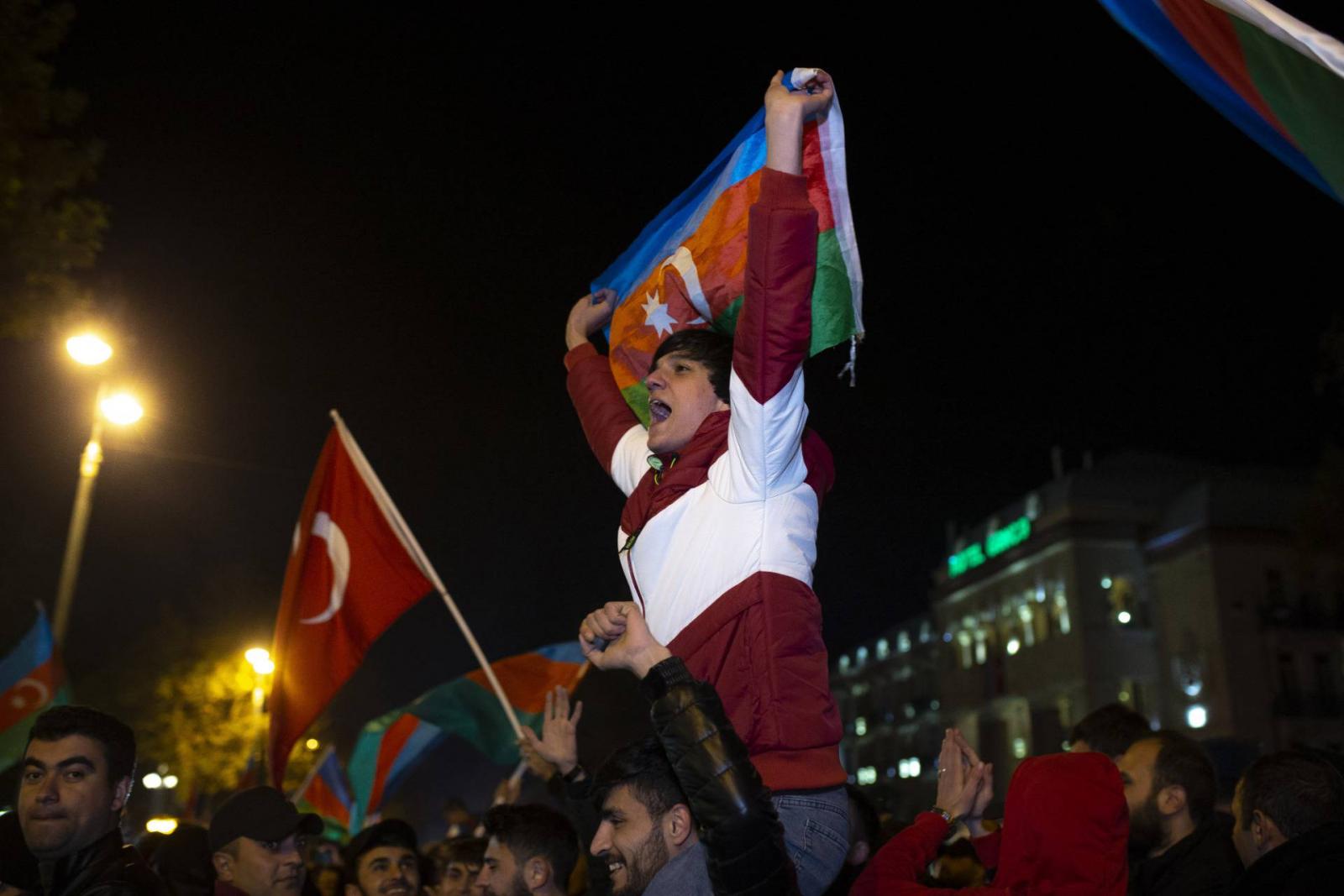 Azerbaijanis celebrate the deal reached on Nagorno-Karabakh