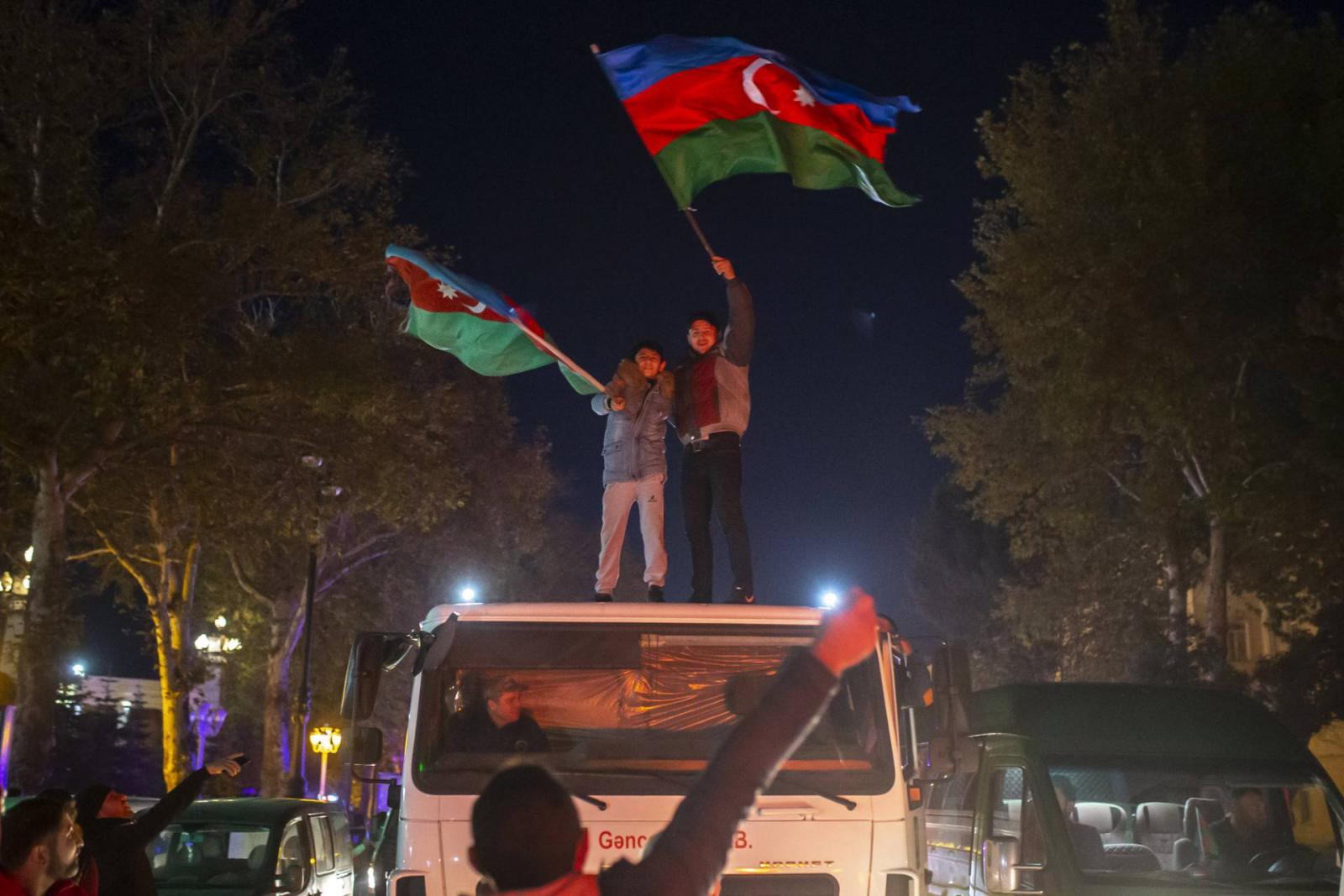 Azerbaijanis celebrate the deal reached on Nagorno-Karabakh