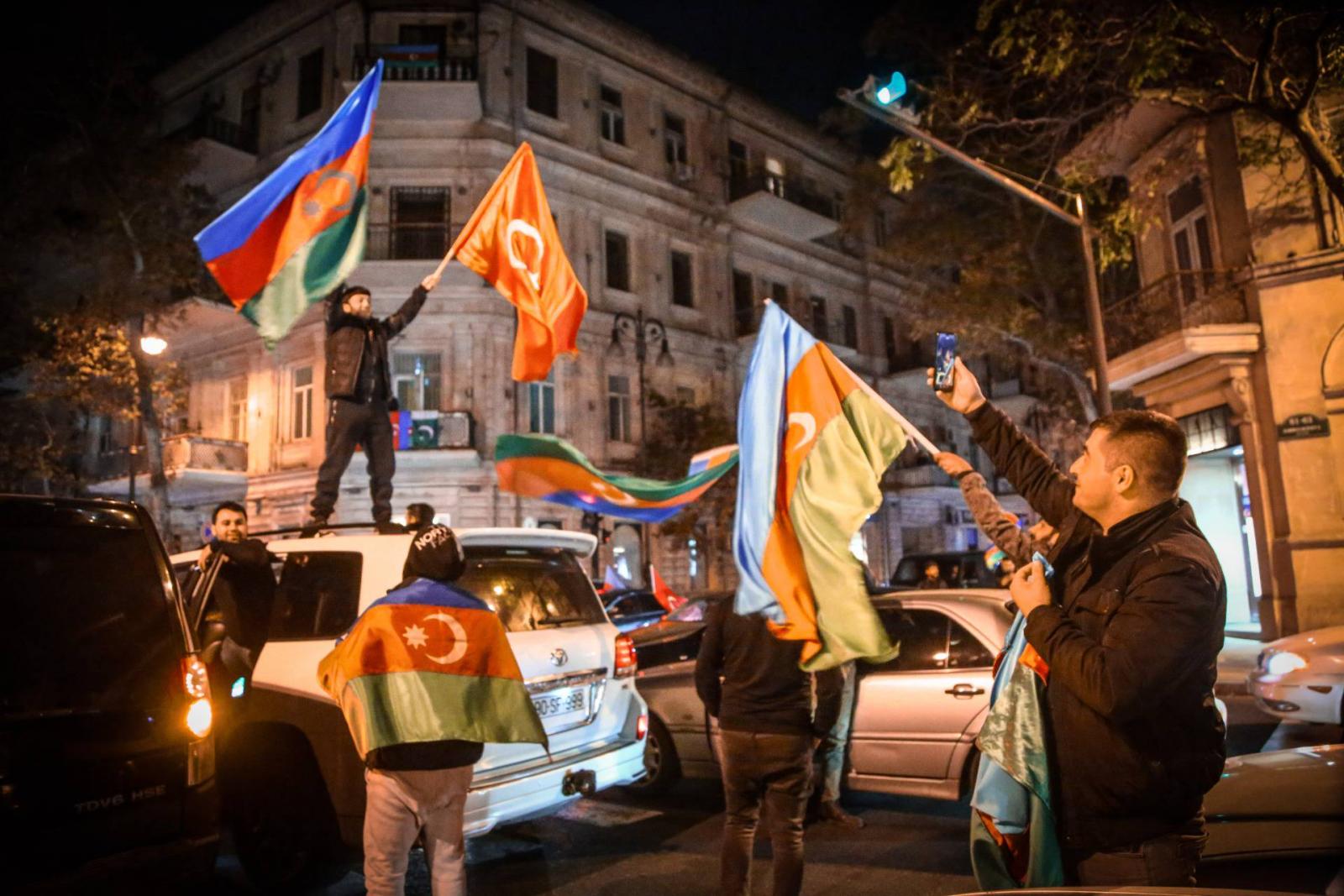 Azerbaijanis celebrate the deal reached on Nagorno-Karabakh