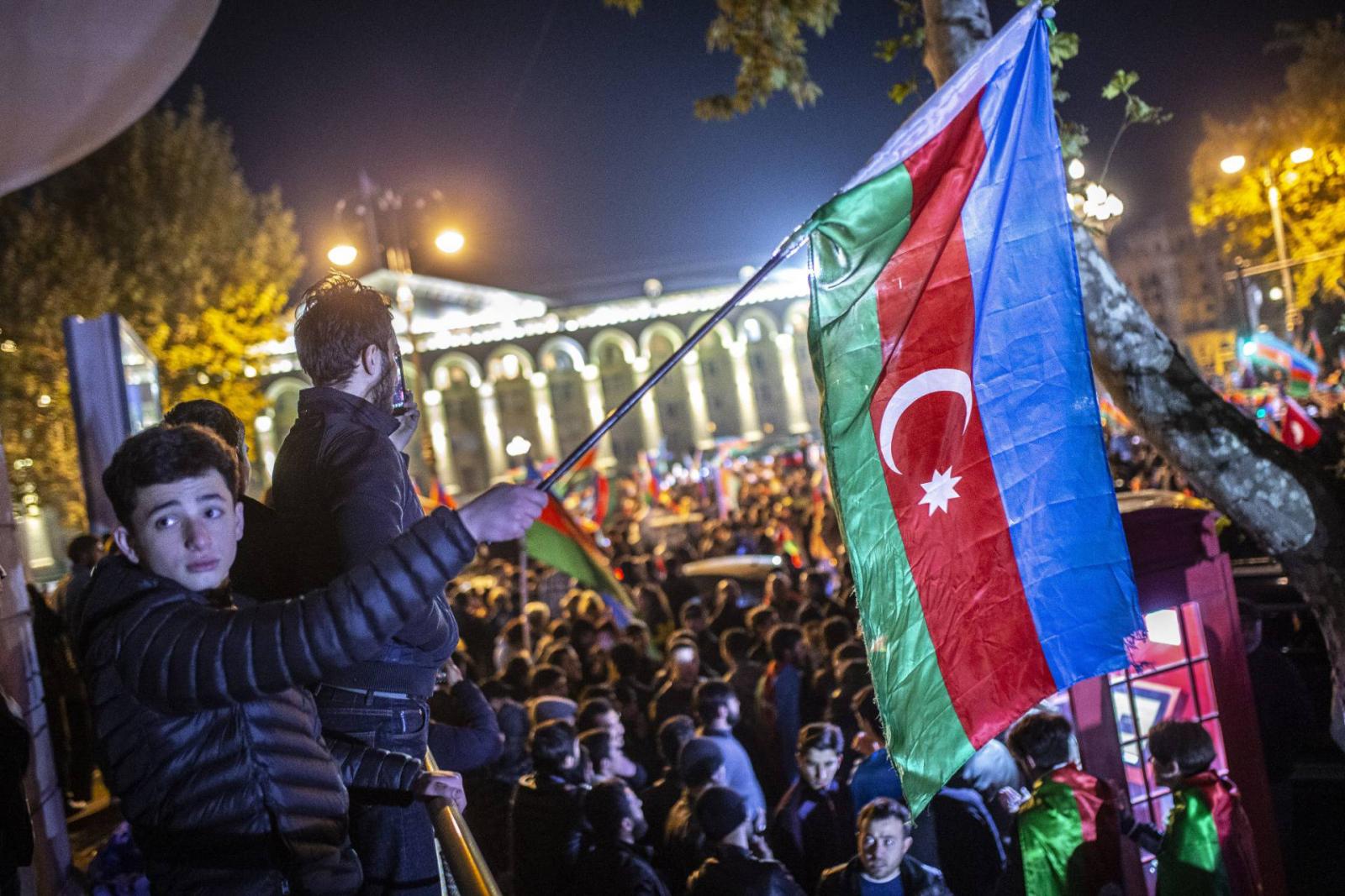 Azerbaijanis celebrate the deal reached on Nagorno-Karabakh