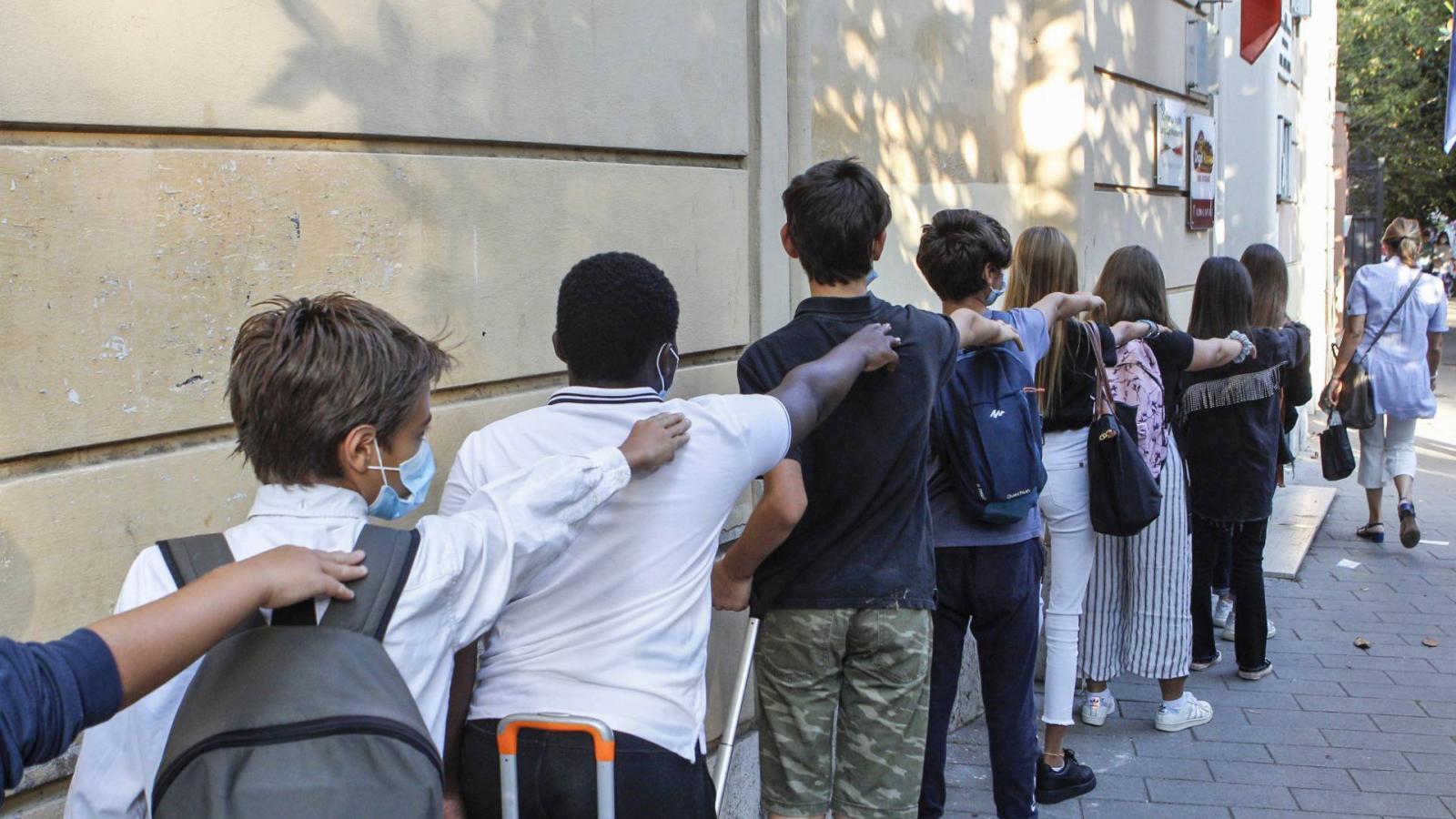 Schools in Italy reopen for first time since March