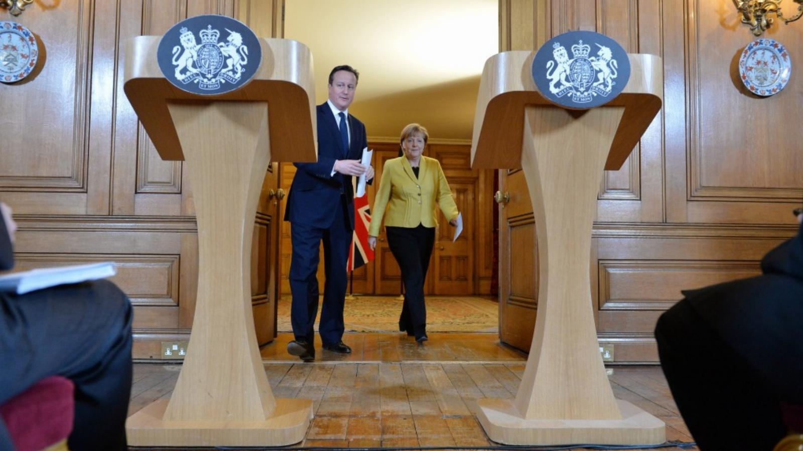 David Cameron és Angela Merkel érkezik a sajtóértekezletre a Downing Street 10-ben FOTÓ: EUROPRESS/GETTY IMAGES