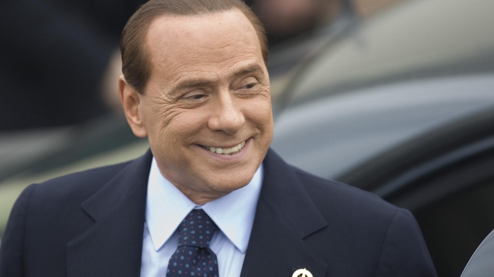 Talán most ráfagy a mosoly Berlusconi arcára. Fotó: Getty Images.