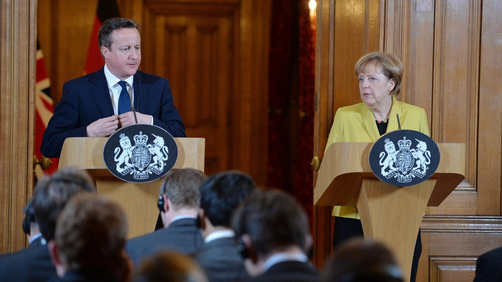 Cameron és Merkel egy korábbi felvételen. FOTÓ:  John Stillwell - WPA Pool/Getty Images