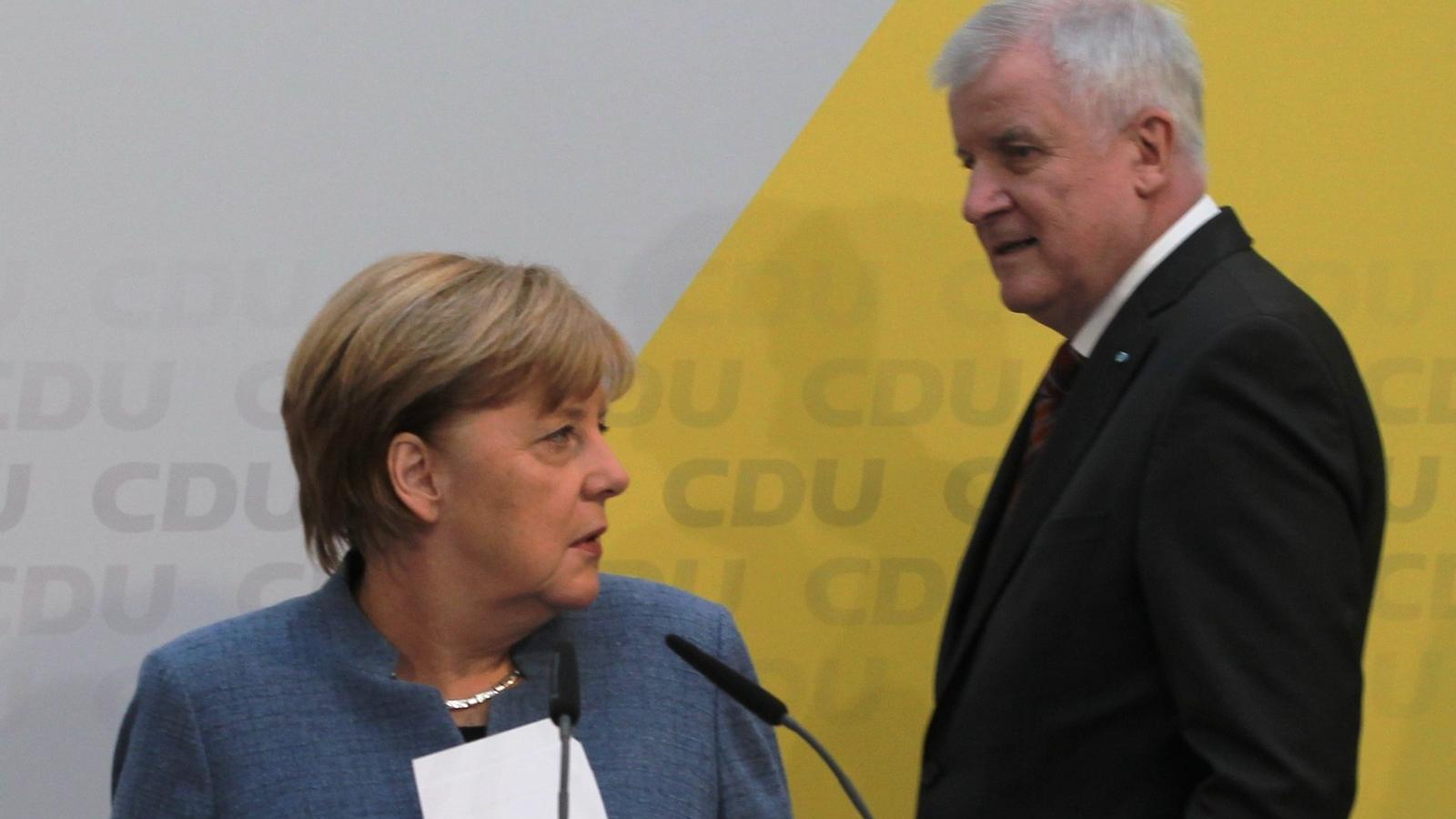 Angela Merkel és Horst Seehofer  - FOTÓ: ERBIL BASAY / ANADOLU AGENCY /AFP