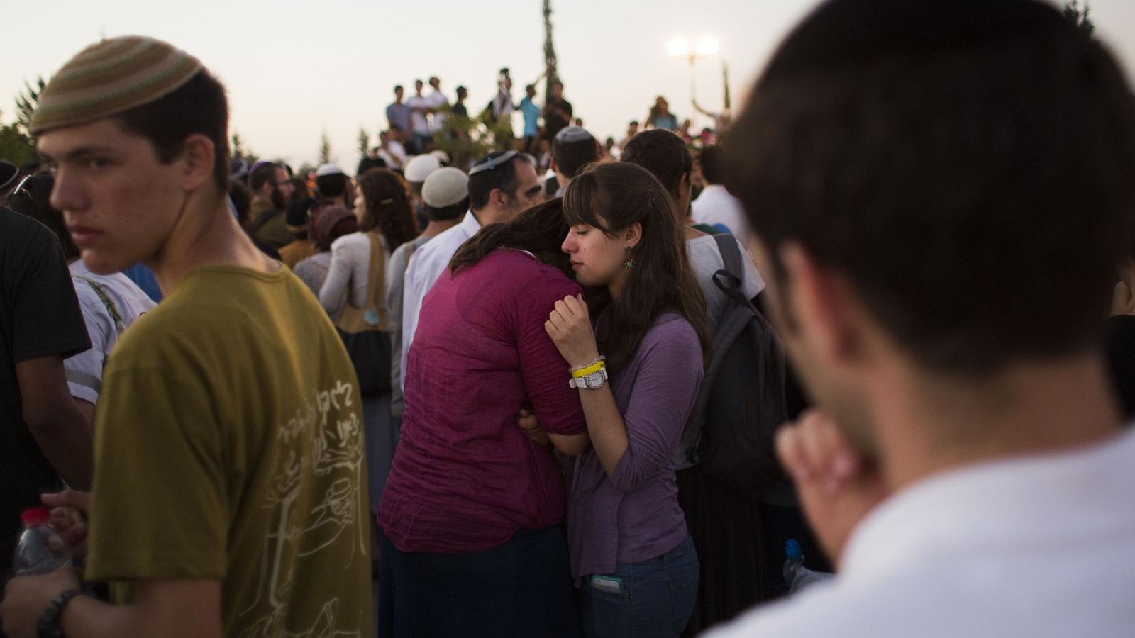 Izrael, 2014, gyász. Július 1-én holtan találták az elrabolt három izraeli tizenévest.  Fotó: Getty Images