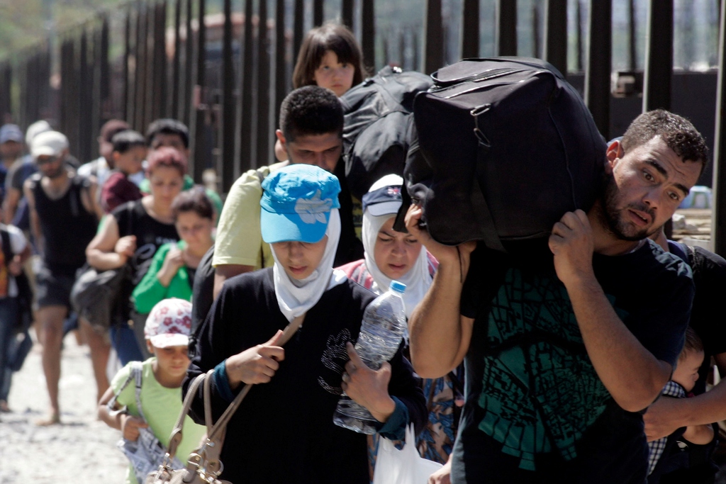 Megannyi nyilván jókedvében útnak induló "migráns" &nbsp;Fotó: Milos Bicanski/Getty Images Hírek