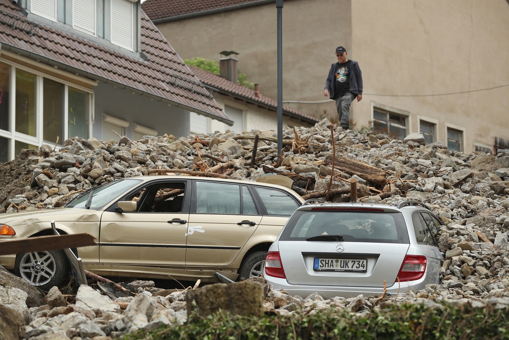 Házak omlottak össze, autókat temettek be a leomlott épületek az ítéletidőben a dél-németországi Braunsbachban FOTÓ: EP/SEAN GALLUP